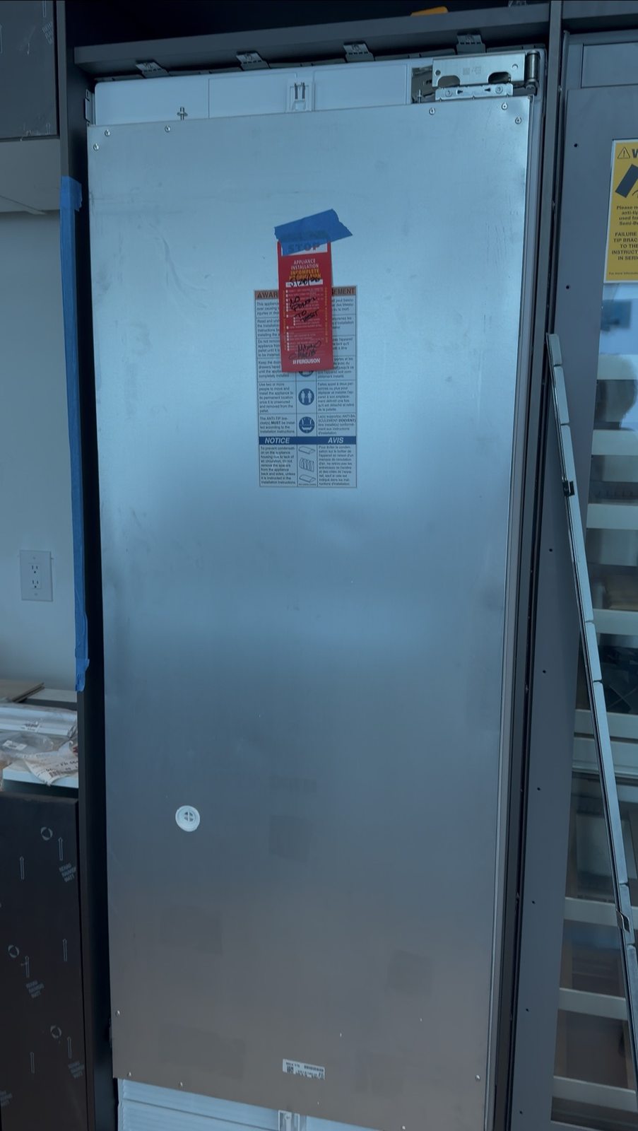 Miele integrated refrigerator installation in progress