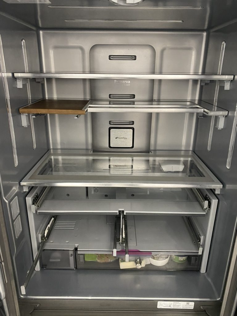 Clean refrigerator interior after service